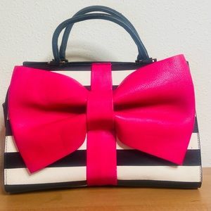 Betsey Johnson! Super cute bag! A great stand alone piece!